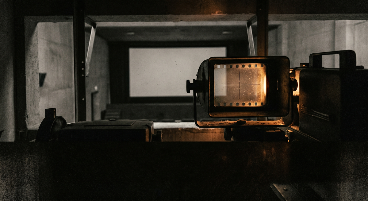 A cinema viewfinder or empty screen framed from the wrong angle — the perspective deliberately displaced, the subject absent where a subject should be.