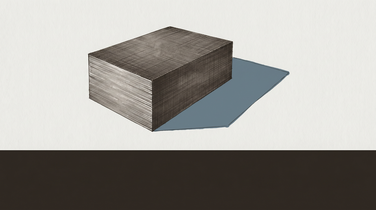 A formal document or architectural surface appearing correct and complete, with a visible shadow or gap suggesting the interior is absent or unresolvable.