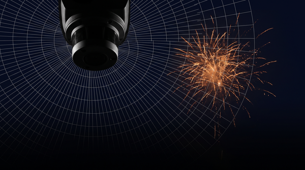 A lidar sensor pod against a night sky — thin scan-grid lines extending outward — a firework bursting beyond the grid, unrendered — the world outruns the model — amber on pale grey.